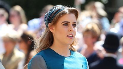 Princess Beatrice arrives at St George&#039;s Chapel at Windsor Castle before the wedding of Prince Harry to Meghan Markle on May 19, 2018 in Windsor, England