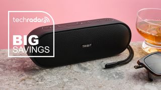 A Tribit Bluetooth speaker with a sign saying &#039;Big savings&#039;