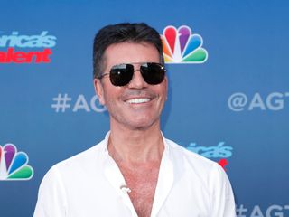 Simon Cowell poses on the red carpet