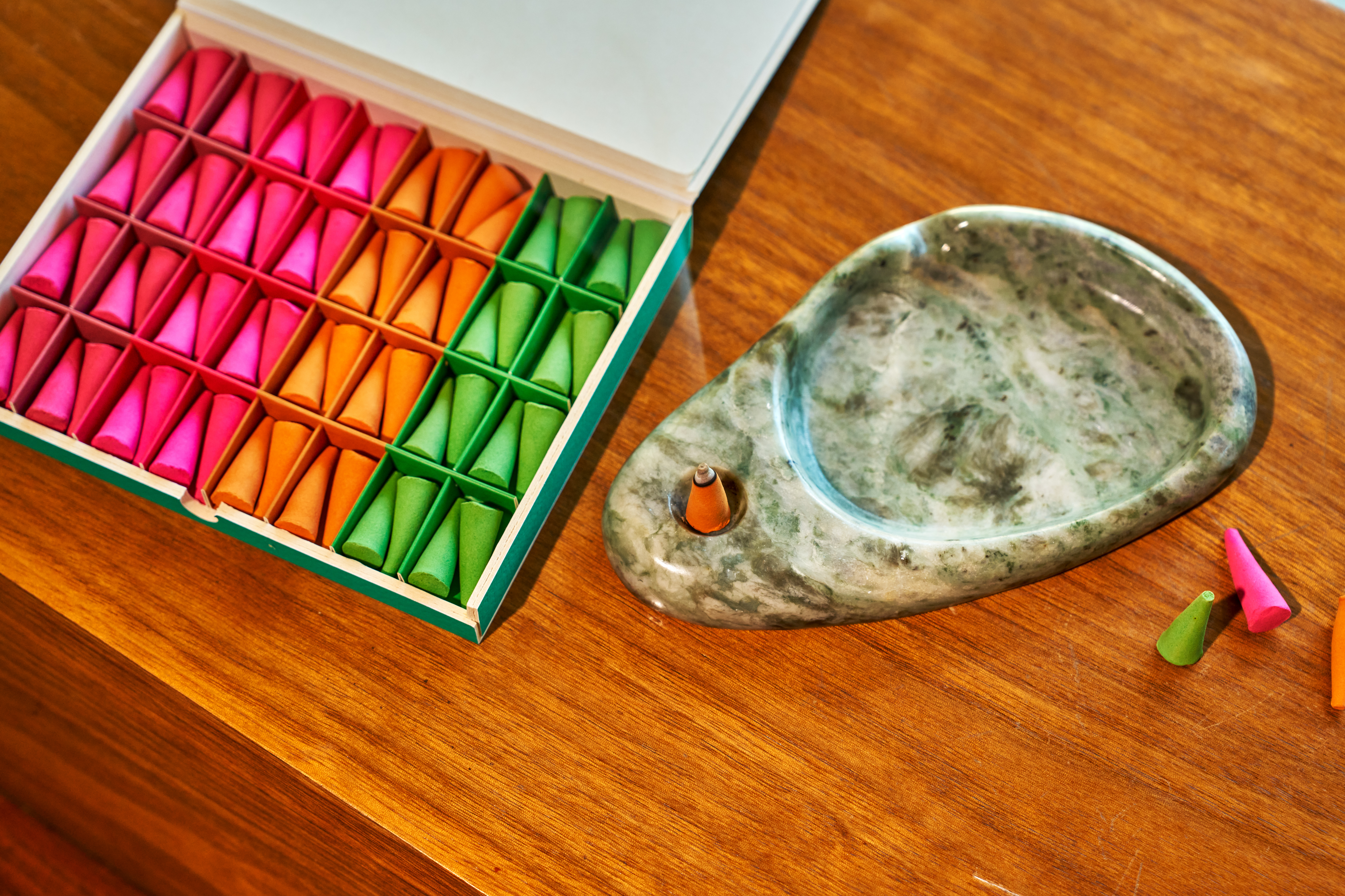 New incense by Seth Rogen's Houseplant collaboration with ripple plus, featuring colourful cones in pink, orange and green