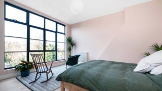 dormer loft conversion bedroom with large metal windows