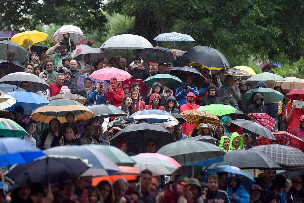 umbrellas were needed for Thursday's stage 12 finish.