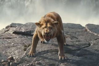 a lion roars on the top of a cliff in a still from mufasa the lion king