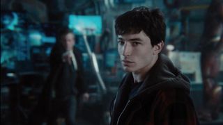 Ezra Miller watching a Batarang fly by in Zack Snyder's Justice