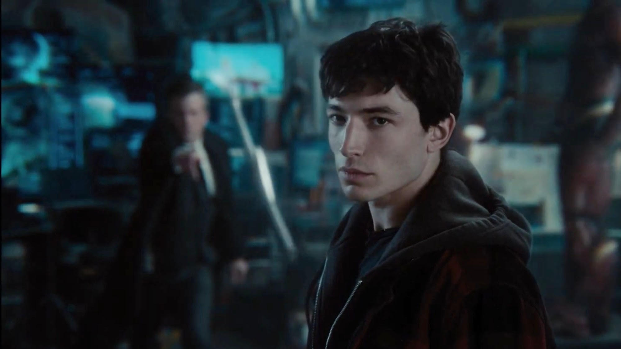 Ezra Miller watching a Batarang fly by in Zack Snyder's Justice