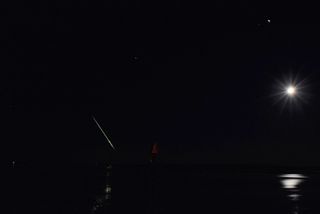 A bright fireball from the Taurid meteor shower lights up the night sky over Grasonville, Maryland in this photo captured by skywatcher Alex M., who reported it to the American Meteor Society.