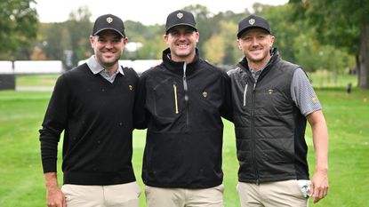 Corey Conners, Taylor Pendrith and Mackenzie Hughes pose for a photo during a Presidents Cup practice round