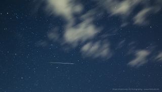 Two Perseid meteors and the Andromeda galaxy photographed by Stojan Stojanovski of Ohrid, Macedonia.