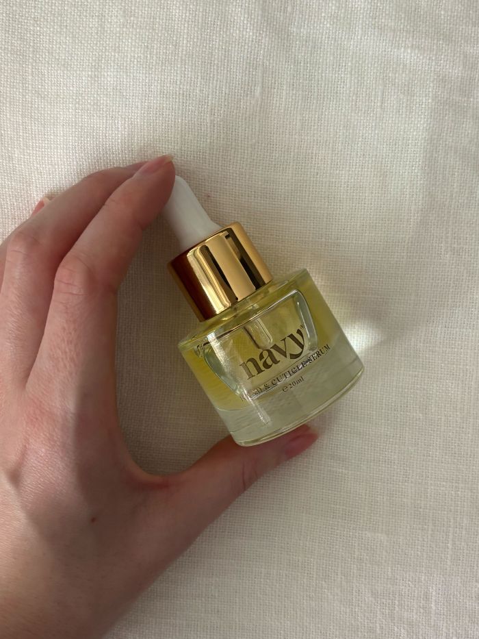 Deputy beauty editor Grace Lindsay testing the Navy Hand &amp;amp; Cuticle Serum