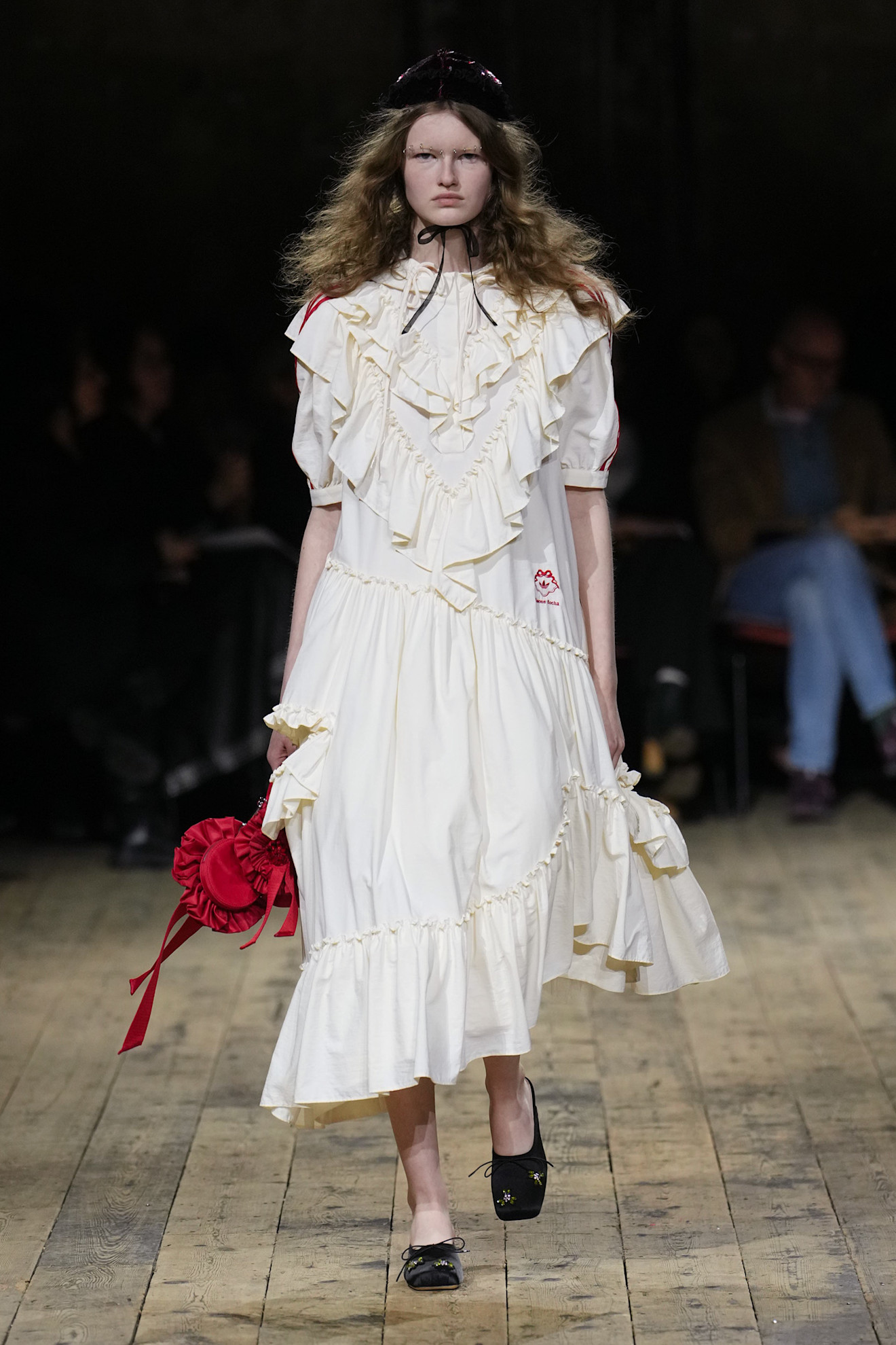 Simone Rocha model wearing a ruffled adidas x simone rocha dress