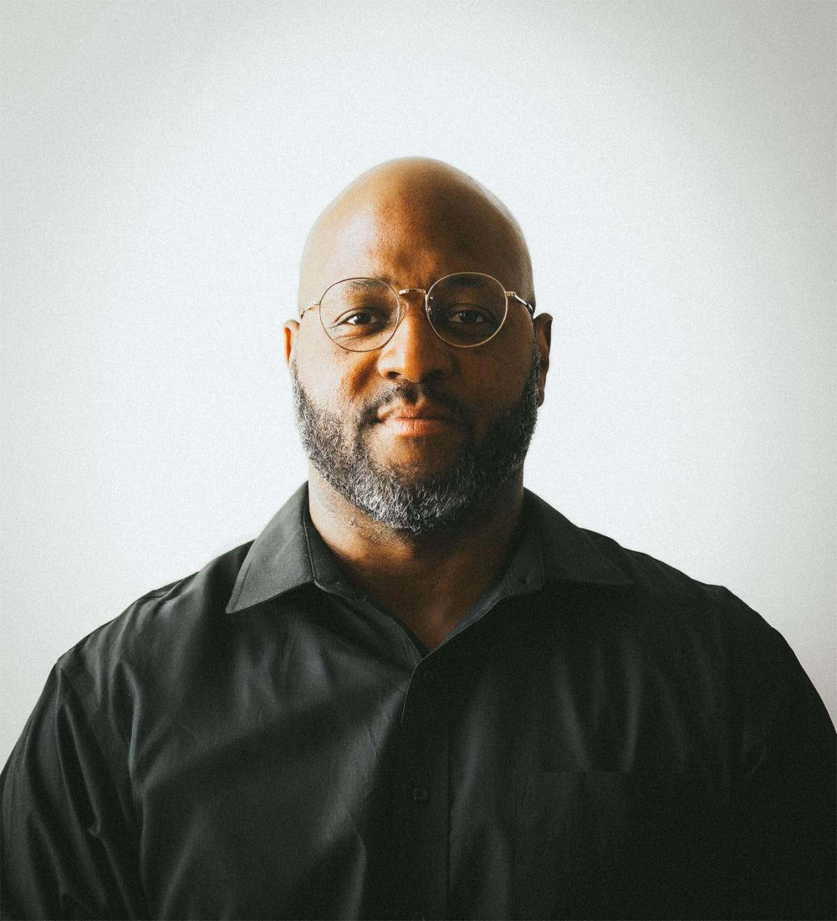 Headshot of Austin Hinton, Solutions Enablement Engineer, QuickLink.