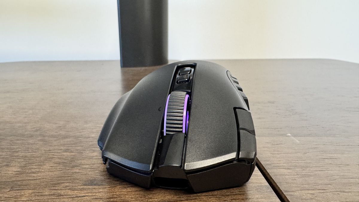 The Razer Naga V3 Pro on a wooden table from the front