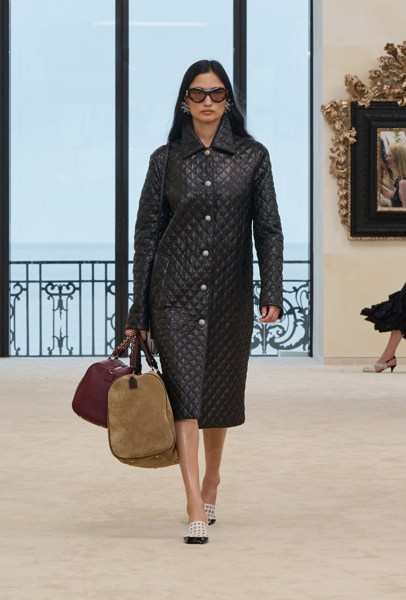 A model carried Kendall Jenner's Chanel bag on the Cruise 2027 runway