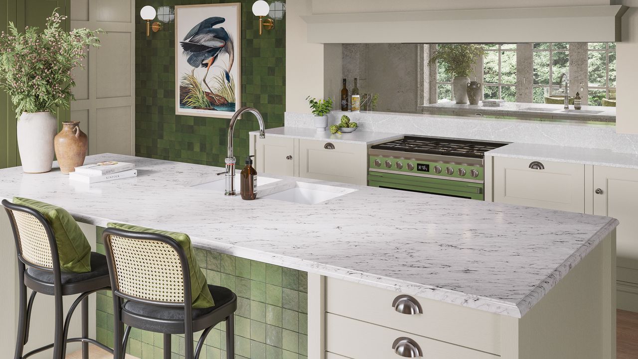 Magnet green and white shaker kitchen with mirrored backsplash.