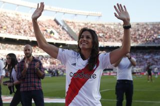 Gabriela Sabatini waves to River Plate fans ahead of a match against Arsenal in February 2023.