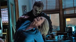 Jamie Lee Curtis and Michael Myers in Halloween Ends.