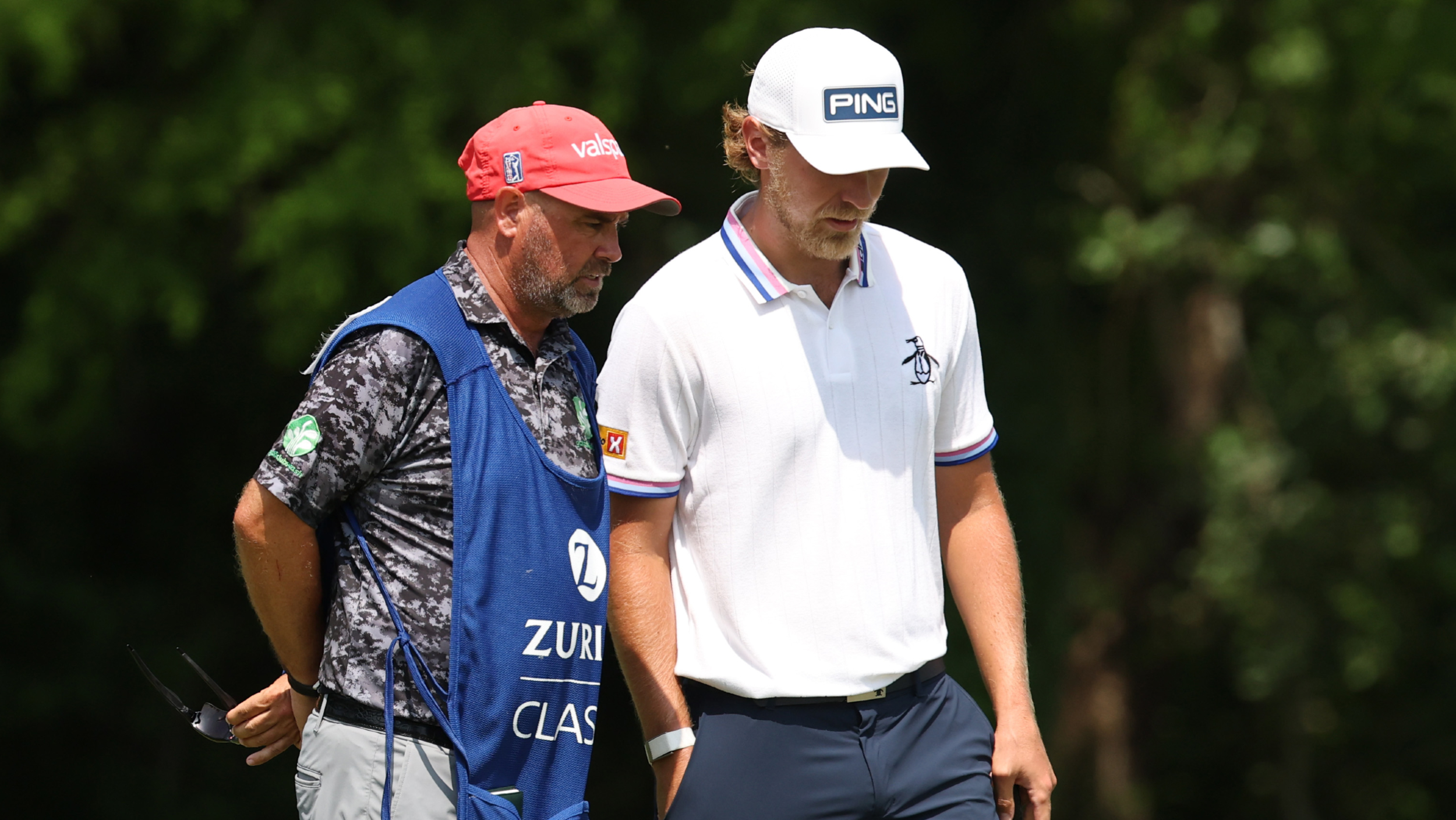 Kristoffer Reitan alongside his caddie