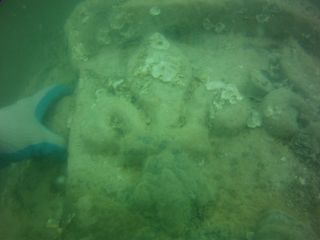 The underwater finds included this distinctive marble monument engraved with the coat of arms of the King of France.