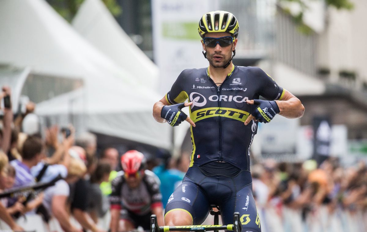 Luka Mezgec (Orica-Scott) points to the sponsors