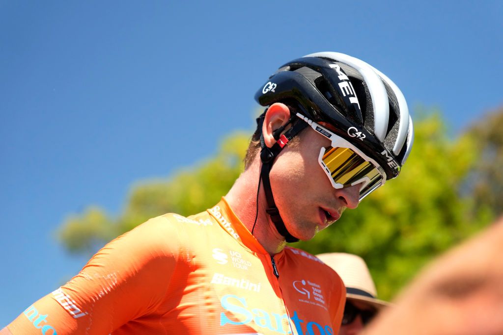 WILLUNGA AUSTRALIA JANUARY 21 Jay Vine of Australia and UAE Team Emirates Orange Leader Jersey reacts after the 23rd Santos Tour Down Under 2023 Stage 4 a 1332km stage from Port Willunga to Willunga Township 138m TourDownUnder WorldTour on January 21 2023 in Willunga Australia Photo by Daniel KaliszGetty Images