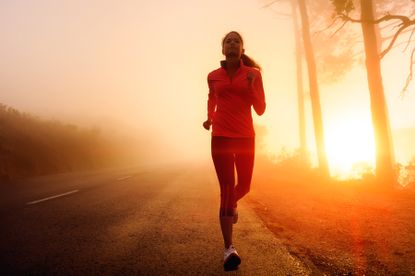 Woman running in the early morning.