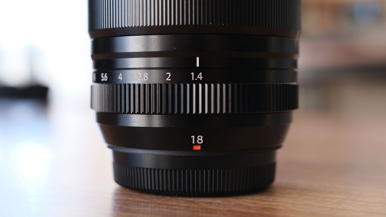 A close-up showing the widest aperture of f/1.4 on the Fujifilm XF 18mm f/1.4 lens