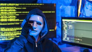 hacker doing computer sabotage using encryption trojan ransomware in hidden base.