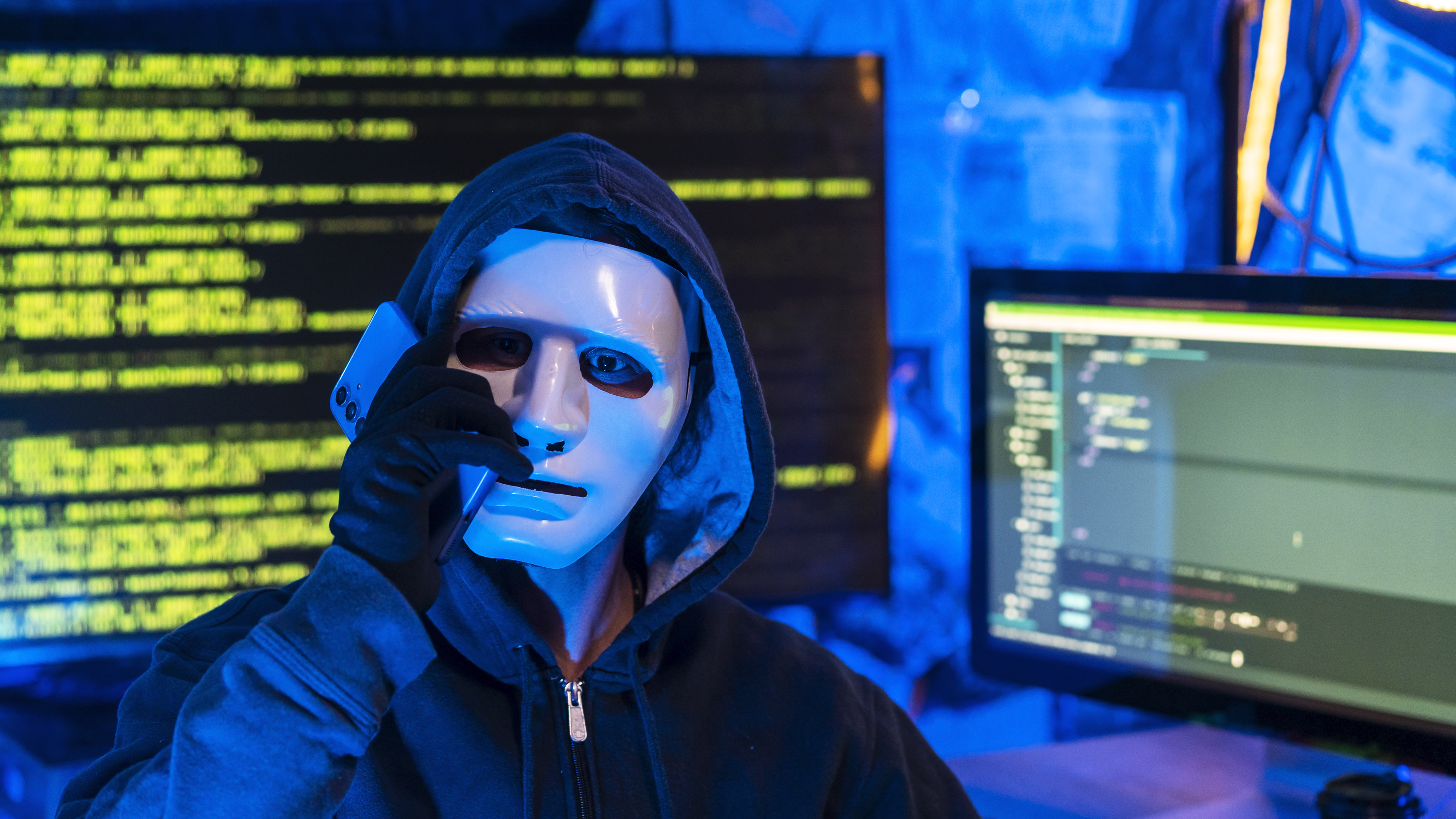 hacker doing computer sabotage using encryption trojan ransomware in hidden base.