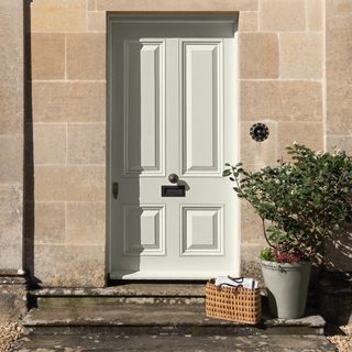 front door colour ideas, Georgian front door painted off-white, classic stone, planter and basket