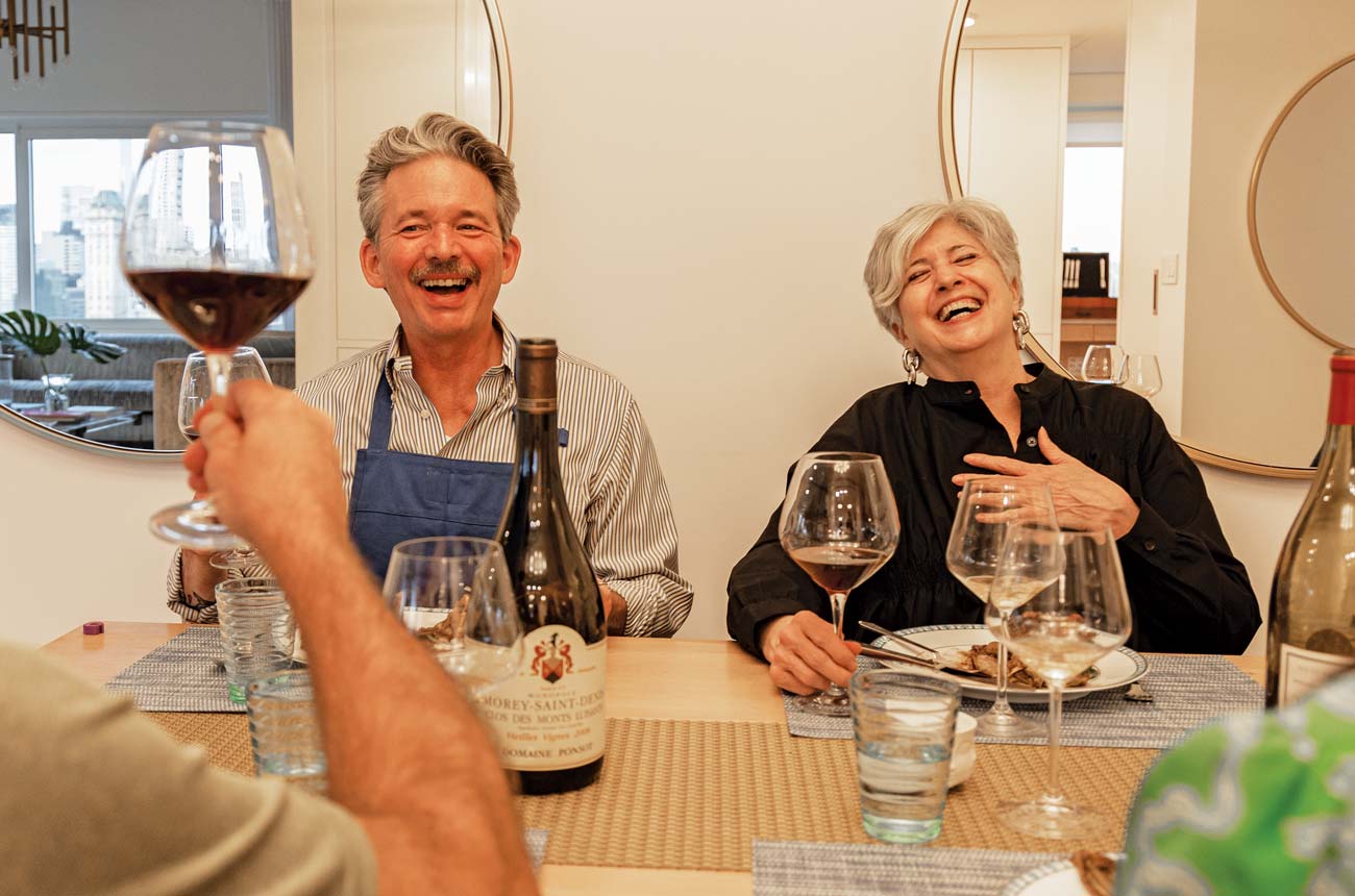 Charles Curtis at a dining table