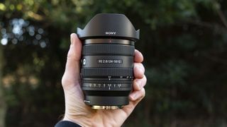Sony FE 24-50mm F2.8 G lens in the hand