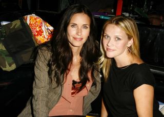Courteney Cox-Arquette and Reese Witherspoon during A Night At The Comedy Store To Benefit The EB Medical Research Foundation Sponsored By Kinerase - Inside at Comedy Store in Los Angeles, CA, United States. (Photo by J. Vespa/WireImage for RPMC)