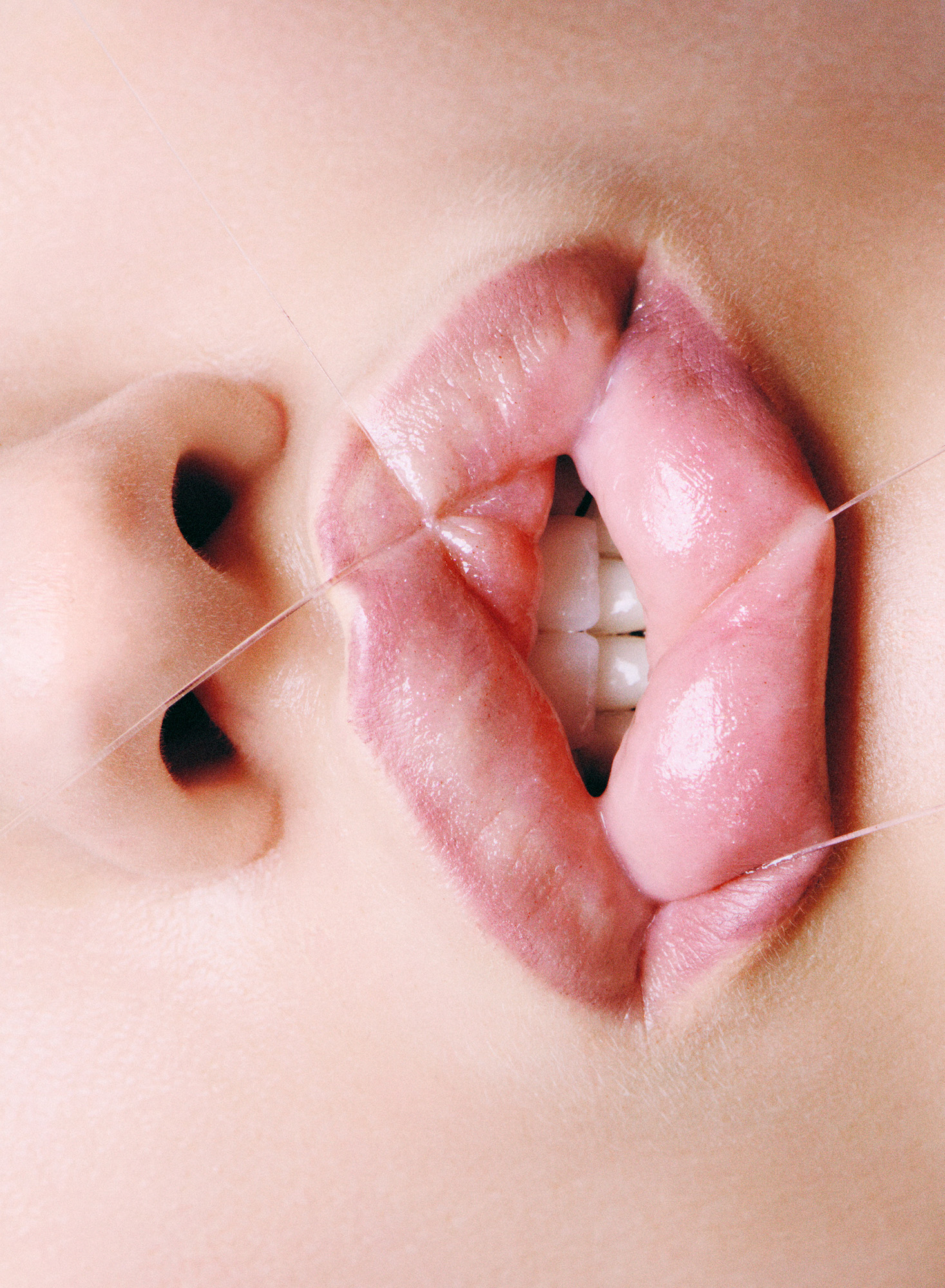 Alexandre Haefeli image of lips and floss