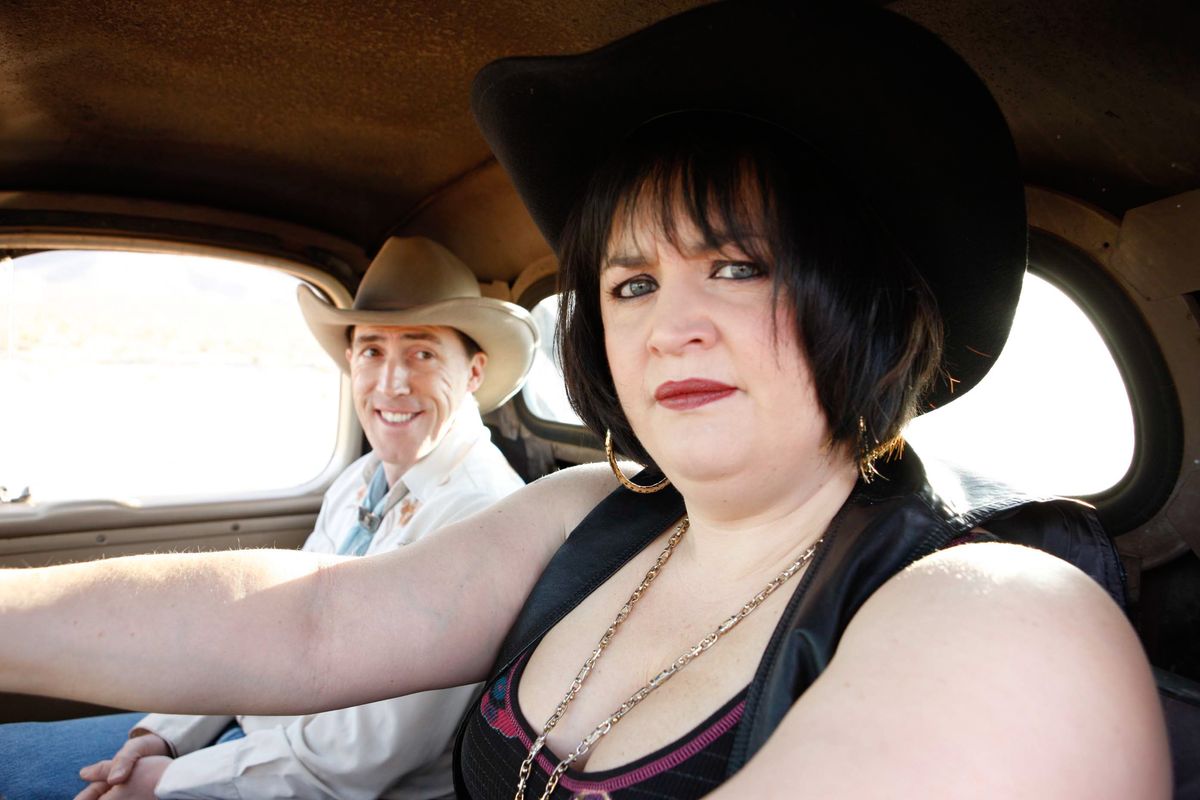 Ruth Jones and Rob Brydon wearing cowboy hates inside a car in Gavin &amp; Stacey