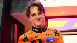 Oscar Piastri celebrates claiming pole at the Qatar Grand Prix.