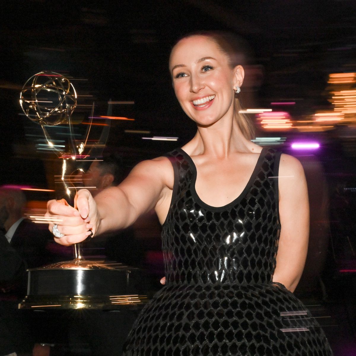 Erin Doherty celebrates her win at the 2025 Emmy Awards