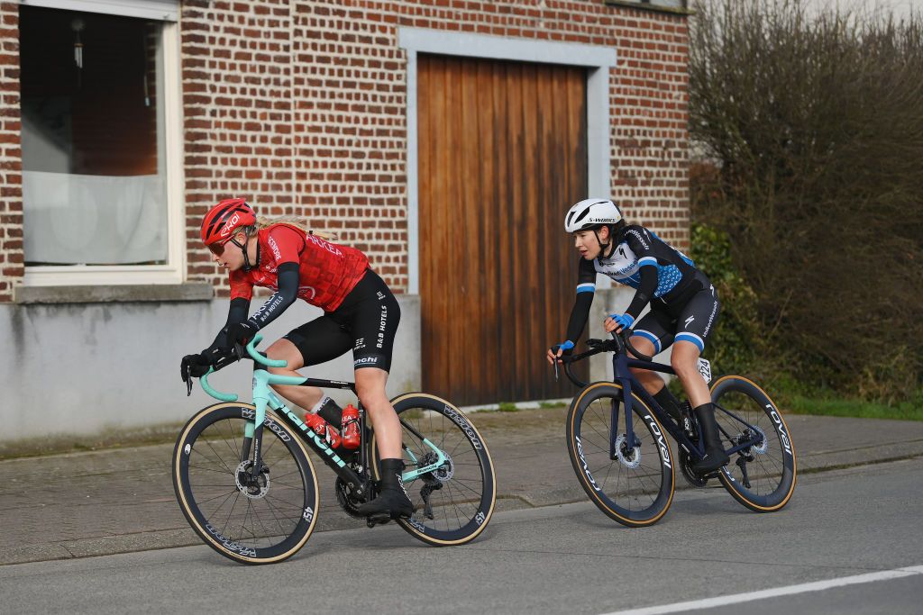 NINOVE BELGIUM FEBRUARY 24 LR Maaike Colje of The Netherlands and Team ArkeaBB Hotels and Marieke Meert of Belgium and Volkerwessels Womens Pro Cycling Team compete in the breakaway during the 16th Omloop Het Nieuwsblad 2024 Womens Elite a 1271km one day race from Ghent to Ninove UCIWWT on February 24 2024 in Ninove Belgium Photo by Alex BroadwayGetty Images