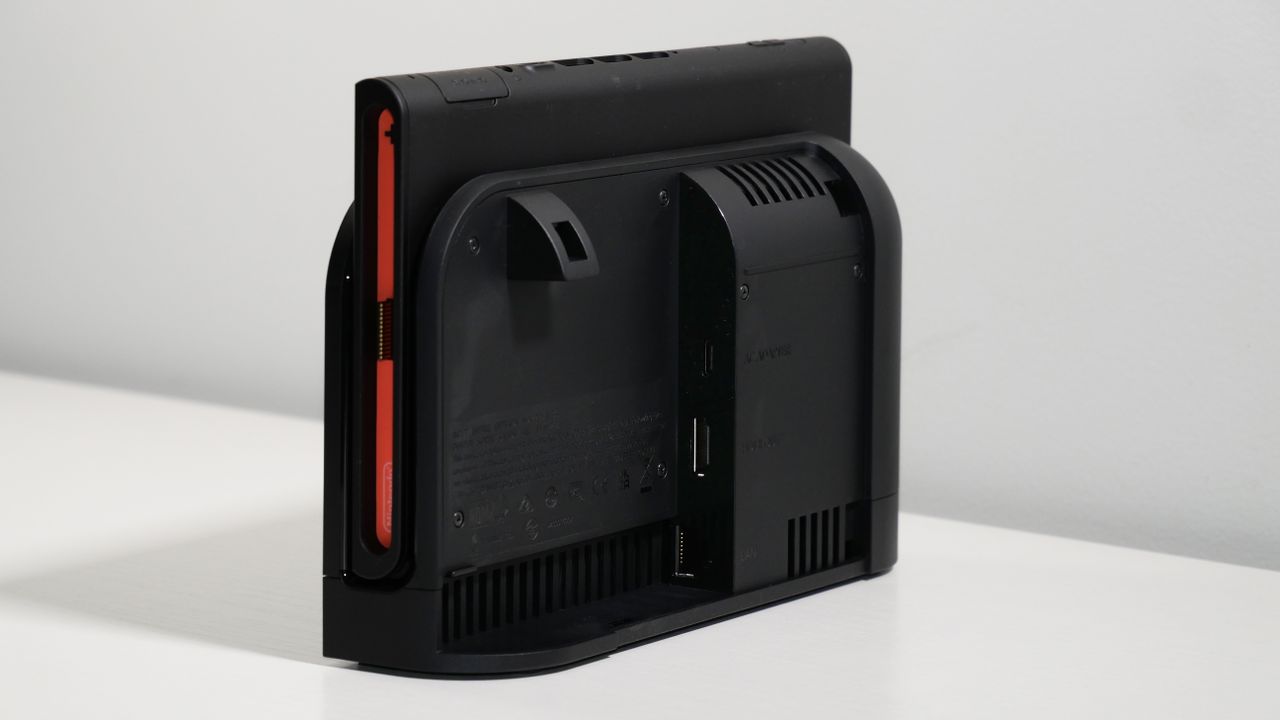 Nintendo Switch 2 docked on a white desk, highlighting the dock ports.