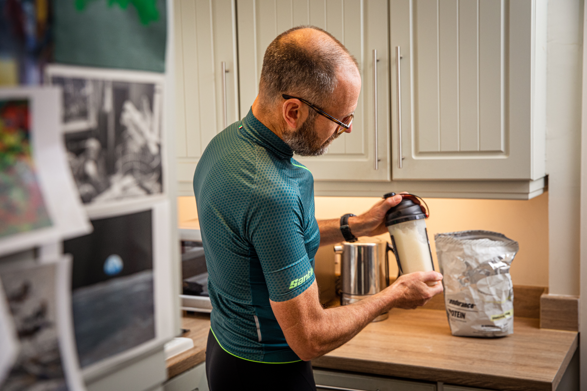 Man making a smoothie in a protein shaker