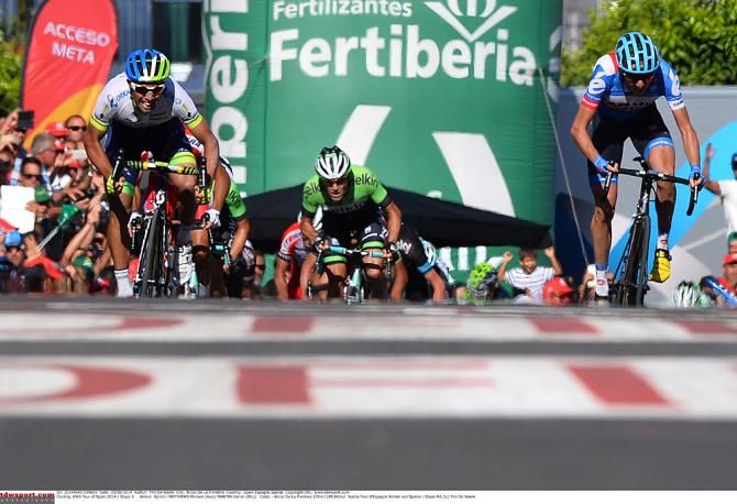 Michael Matthews (Orica-GreenEdge) and Dan Martin (Garmin-Sharp) sprint to the stage 3 finish line