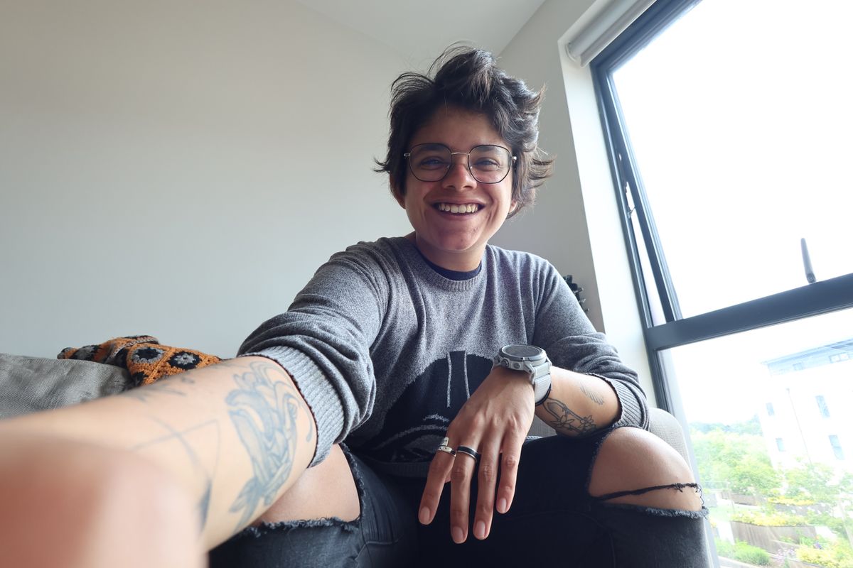 A selfie taken on a Canon PowerShot V10 vlogging camera, showing Staff Writer Reviews Nikita Achanta beaming