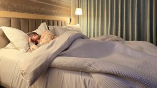 Mattress tester sleeping on a Bryte Balance Smart Bed at the Park Terrace in New York City