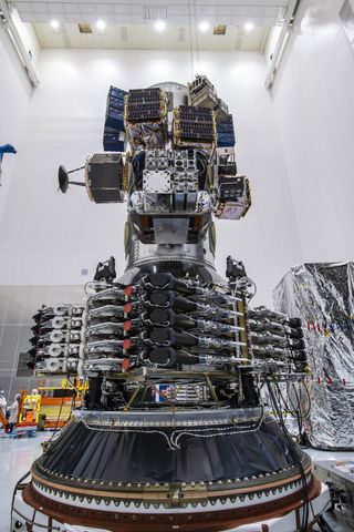 The 143 satellites of SpaceX's Transporter-1 mission are seen in their stacked position before launch for the company's first dedicated rideshare mission.