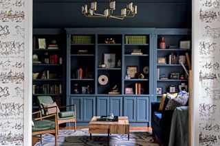 Blue mid-century modern living room by JL Design