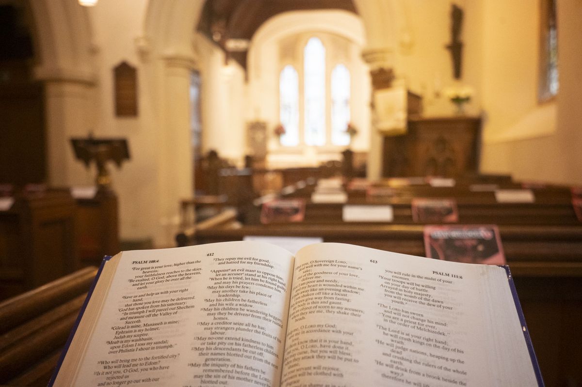 Viltrox AF 28mm F4.5 image gallery: inside an old church, with an open bible on a pew