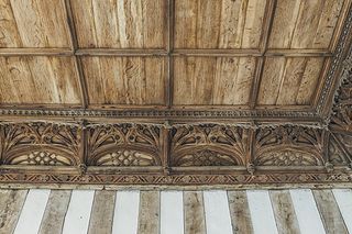 Lyddington: A detail of the richly carved cornice that survives in the two rooms. Note the remaining traces of colour.