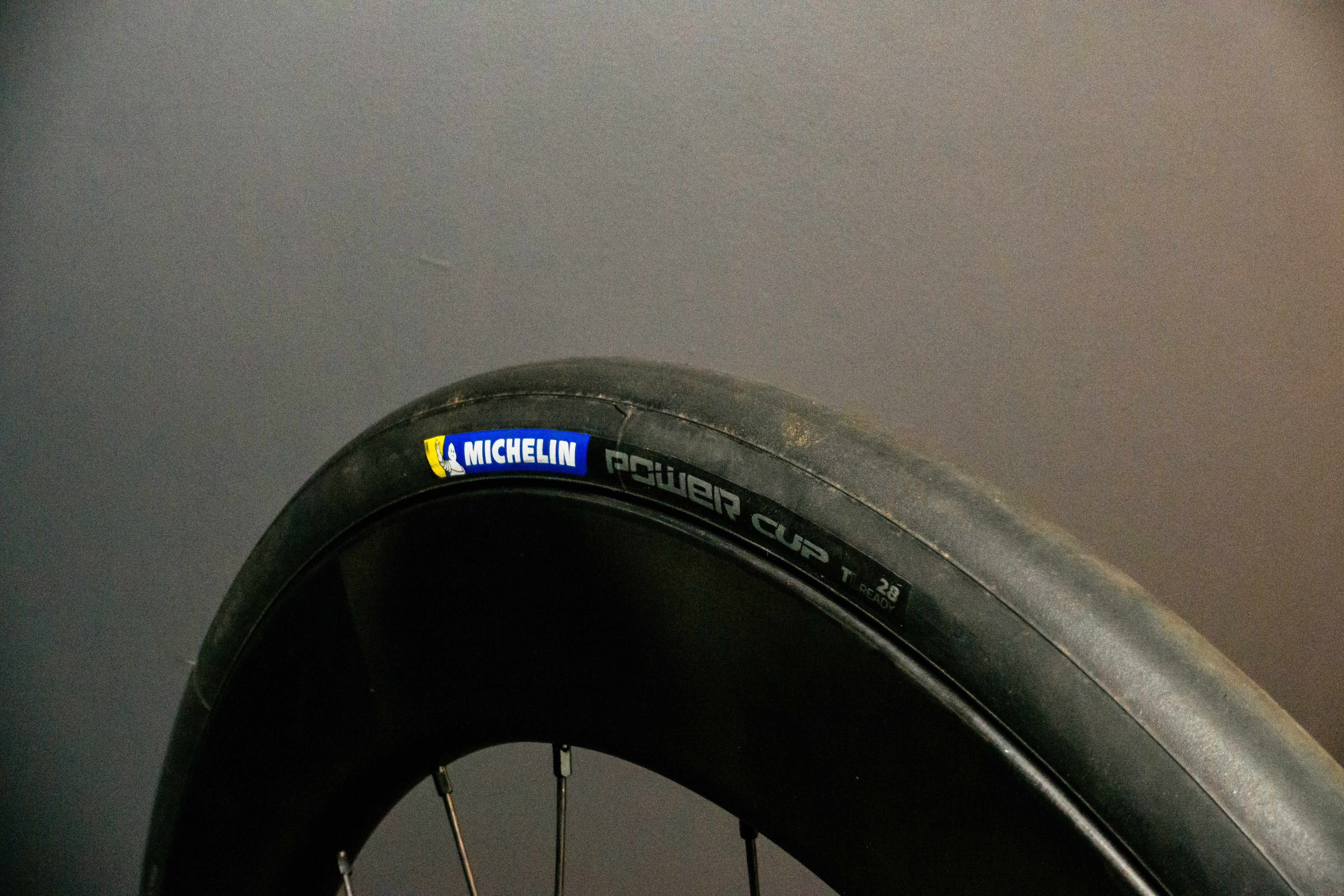 Michelin Power Cup Road tyre on a grey background