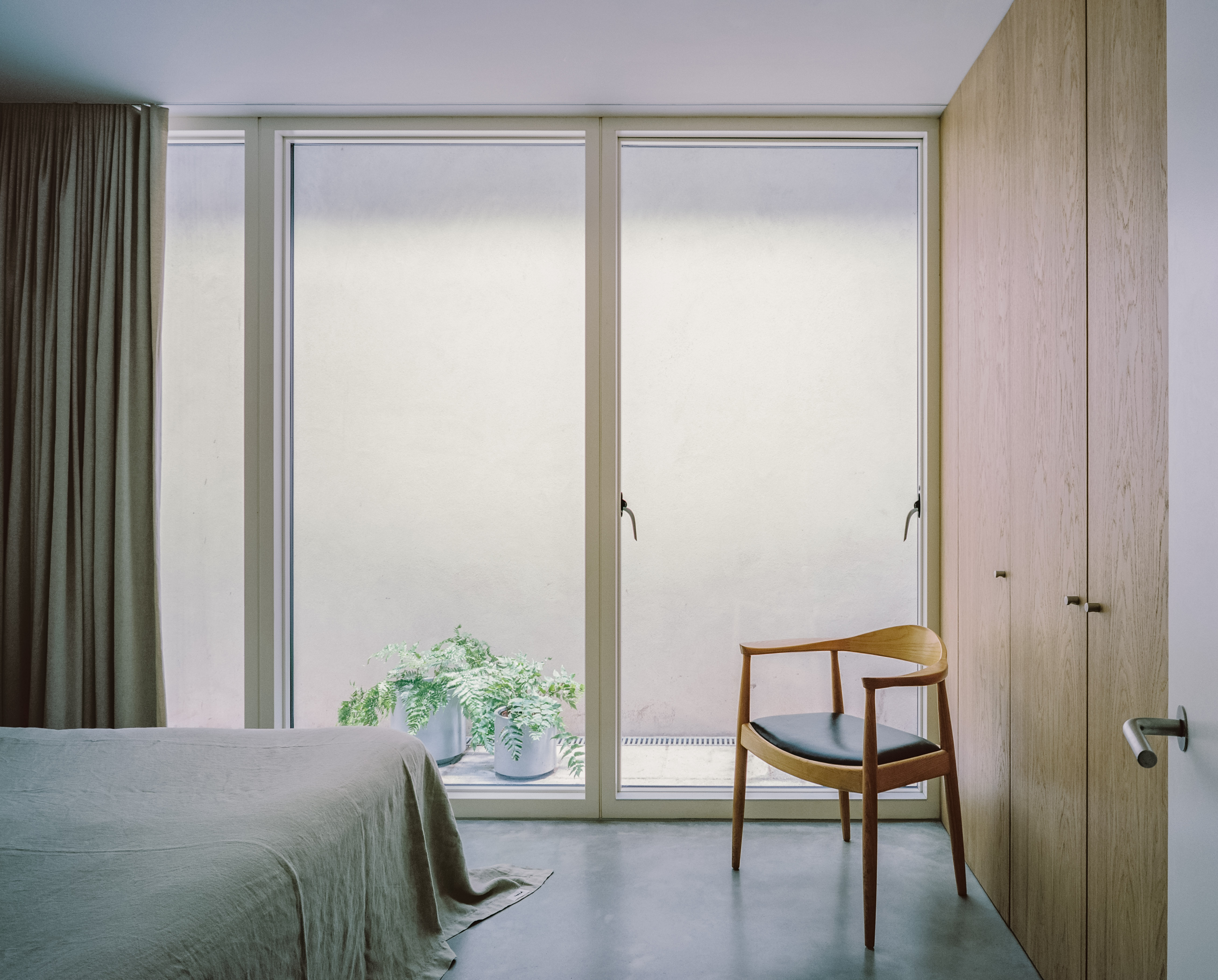 The basement bedrooms are illuminated by lightwells