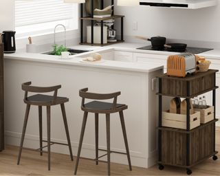 Furrino furniture including wooden bar stools and kitchen storage on castor wheels surrounding white kitchen peninsula