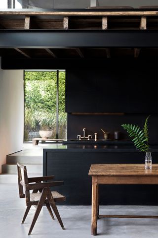 Contemporary black kitchen by Michael Del Piero